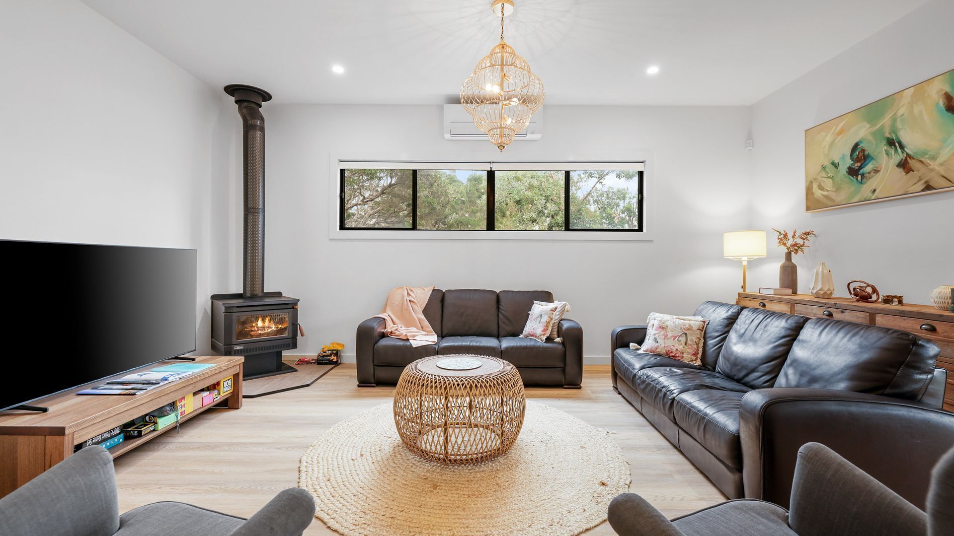 TV, fireplace, books