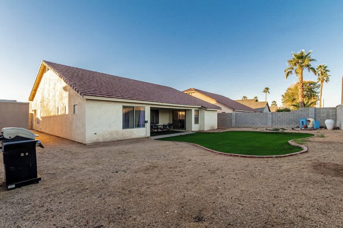 Private backyard space with BBQ grill