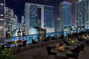 Outdoor dining - Brickell Bay Condo with Huge Balcony and Pool (Miami)