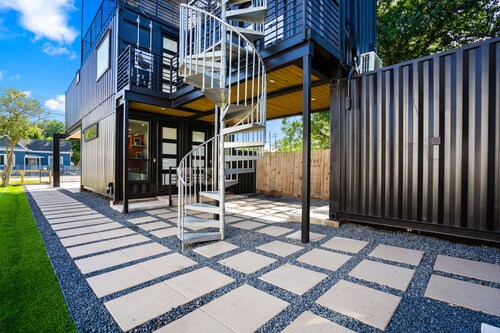 Modern container-style guest house with shared hot tub, BBQ, dog friendly