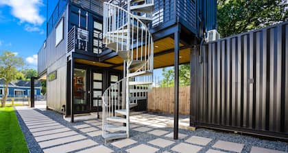 Modern container-style guest house with shared hot tub, BBQ, dog friendly