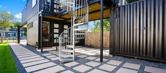 Modern container-style guest house with shared hot tub, BBQ, dog friendly