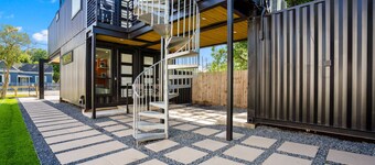 Modern container-style guest house with shared hot tub, BBQ, dog friendly