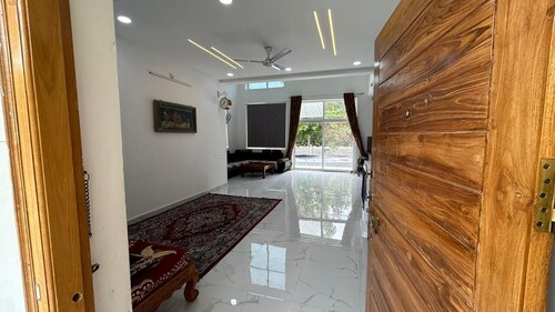 Tranquil 3-bedroom farmhouse with AC in charming Hyderabad