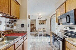 Fridge, microwave, oven, stovetop - Cozy Mountain Retreat w/ Fireplace & Scenic Balcony (Sugar Mountain)