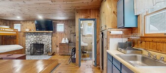 Cozy studio cabin w/ seasonal mountain views, wrap-around deck, window a/c, bbq