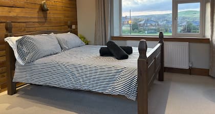 Detached 3-bedroom house with parking, EV charging and garden cinema room