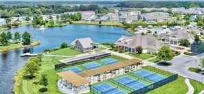 A residential area with a lake, tennis courts, and houses. - 4 Mi to Beach • 3 Pools • Dog Friendly • Pond View •5 Bedrooms (Millville)