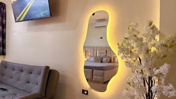 Superior Suite, 1 King Bed with Sofa bed, Balcony, Partial Ocean View | Living area