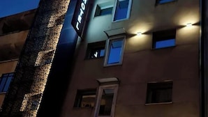 A hotel with a 'Star in N' sign, multiple windows, and a decorative facade. - Star Inn Hotel Aeroport (Algiers)