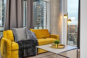 Elite Suite, 2 Bedrooms, Non Smoking | Living area | 50-inch TV with digital channels - Harbourfront West at City Centre (Toronto)
