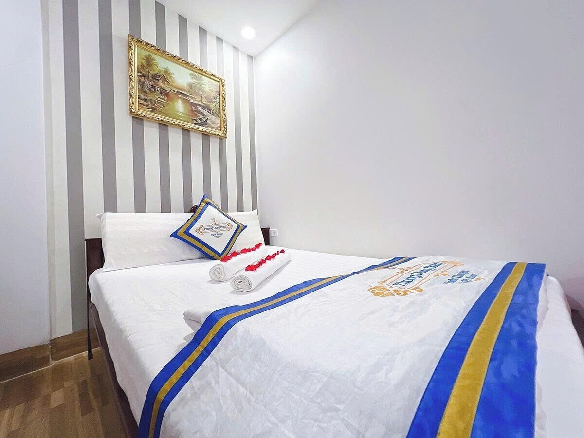 Doppia Economy, 1 letto queen, bagno privato, di fronte alla spiaggia | Una scrivania, postazione laptop, tende oscuranti, insonorizzazione