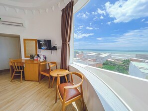 Habitación doble Premium, 1 cama King size, vista a la playa, frente al mar | Interior