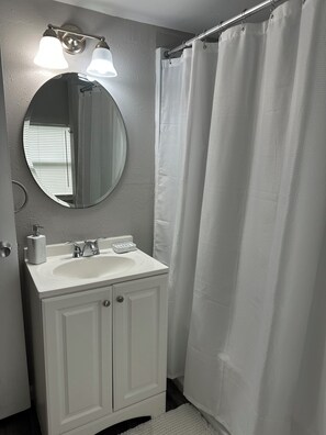 Hair dryer, towels, soap, shampoo