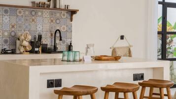 Fridge, microwave, stovetop, coffee/tea maker