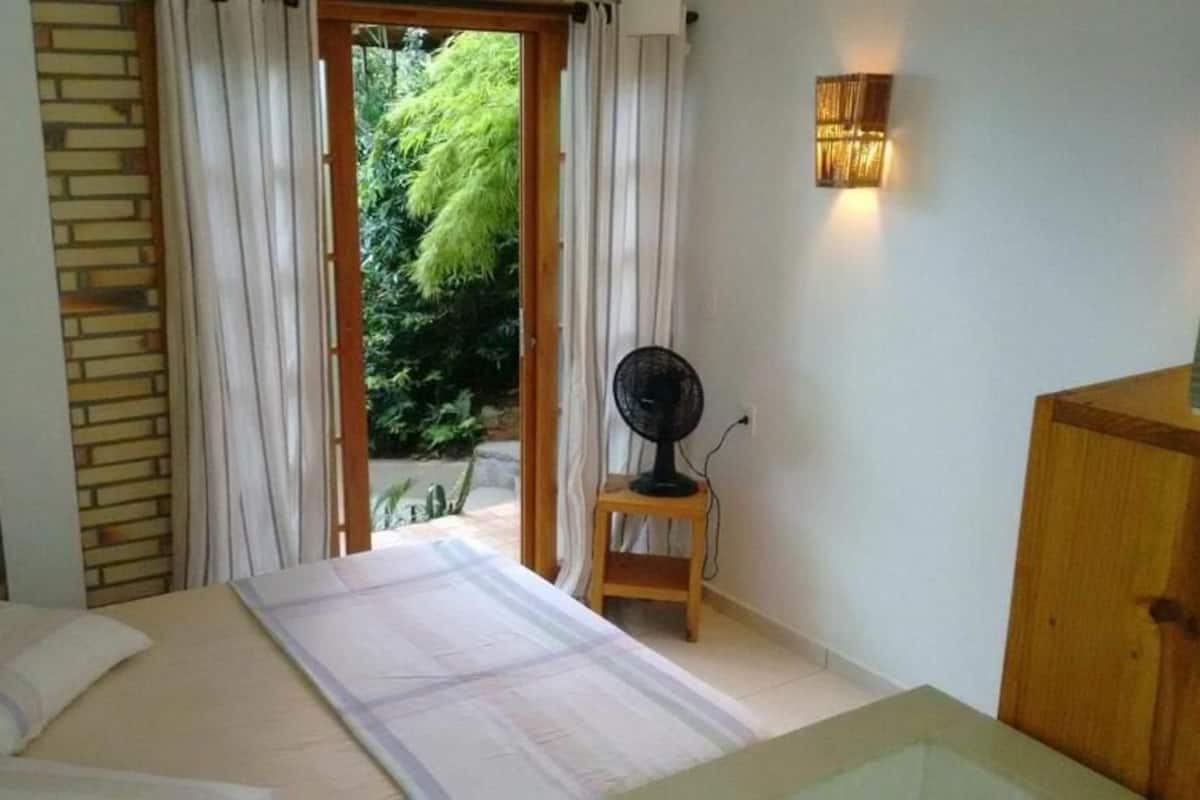Double Room, Pool View | Blackout drapes, iron/ironing board, free WiFi