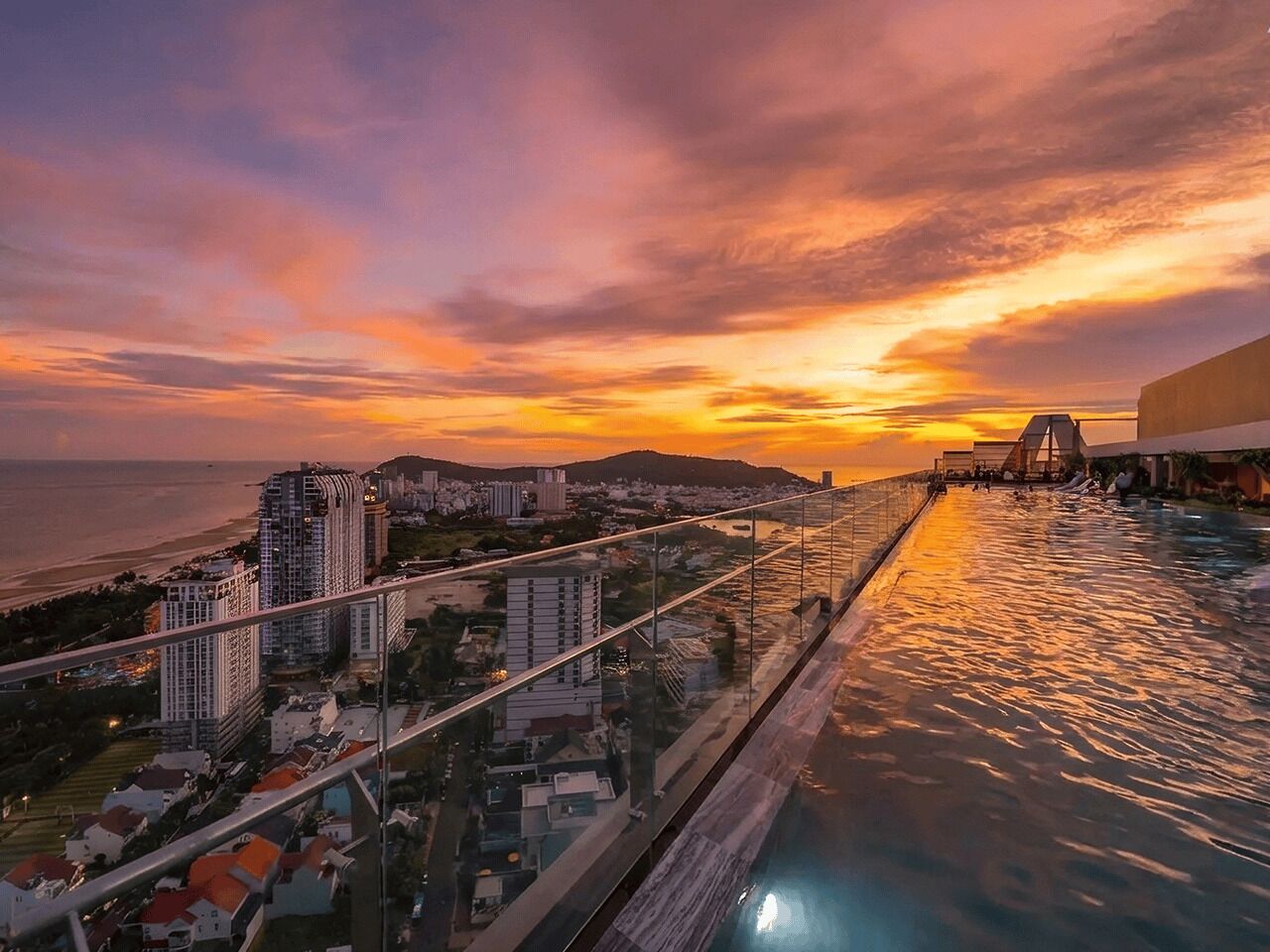 Outdoor pool, open 6:00 AM to 6:00 PM, pool loungers, lifeguards on site