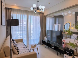 Apartamento, 2 quartos, cozinha americana, vista para o jardim | Área de estar