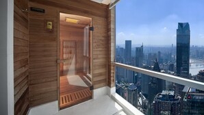 A modern room with a wooden wall, a glass door, and a city view. - SEYA Panoramic Hotel - Chongqing Cloud Eye - Managed by SEYA GROUP (Chongqing)