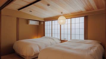 Habitación tradicional con 2 camas individuales | Minibar con artículos gratuitos, wifi gratis, ropa de cama