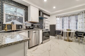 Fridge, microwave, stovetop, dishwasher - Modern Motor City Home w/ Office & Deck! (Detroit)
