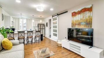 TV, fireplace, books