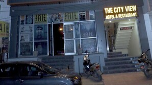 A hotel named "Sky Tower" with a "City View" sign, multiple windows, and a visible entrance. - The City View- Hotel And Restaurant (Bhiwani)