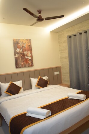 Deluxe Double Room, Balcony, City View | Desk, laptop workspace, free WiFi - Relax Inn Suites & Rooms (Penumuluru)