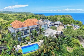 Unclassified image, 4 of 65, button - Kelingking Point (Penida Island)