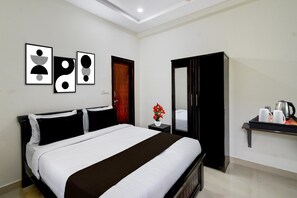 1 室のベッドルーム、デスク、ベッドシーツ