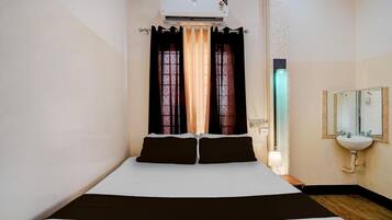 1 bedroom, desk, bed sheets