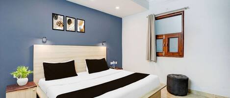 1 室のベッドルーム、デスク、ベッドシーツ