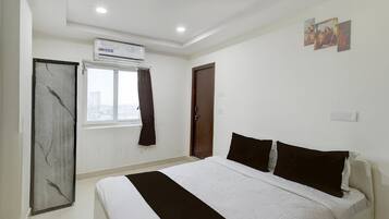 1 bedroom, desk, bed sheets