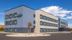 A modern Microtel hotel with a flat facade, multiple windows, and a parking lot. - Microtel Inn & Suites by Wyndham Ephrata (Ephrata)