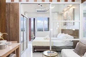 Unclassified image, 2 of 42, button - Elegant Wood-Accent Studio with Balcony (Lapu-Lapu)