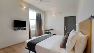 1 bedroom, desk, bed sheets