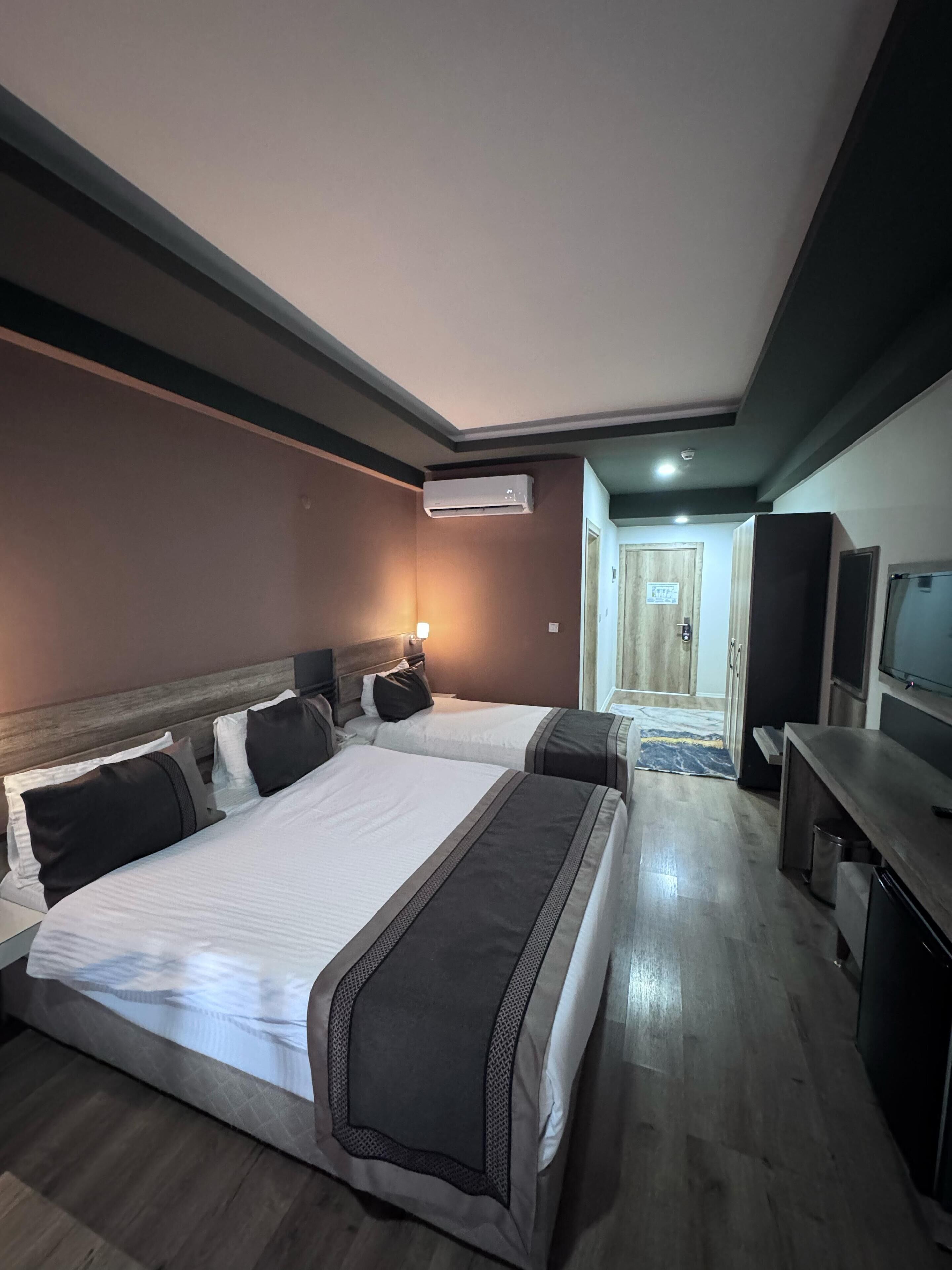 Desk, laptop workspace, blackout curtains, free WiFi