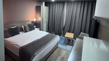 Desk, laptop workspace, blackout drapes, free WiFi