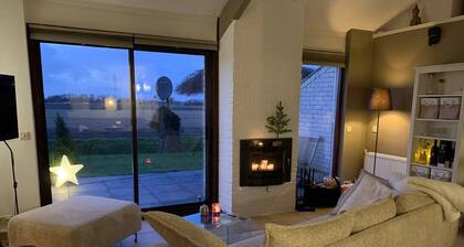 Forest cottage by the sea