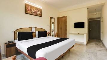 1 camera, una scrivania, lenzuola