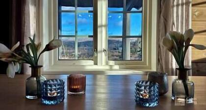 Cabin in magnificent landscape and hot tub inside