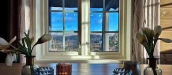 Cabin in magnificent landscape and hot tub inside