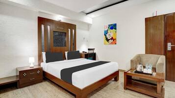 1 bedroom, desk, bed sheets