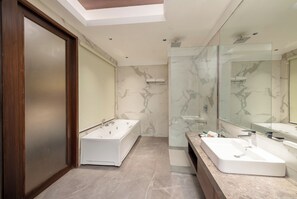 Luxury Room | Bathroom | Slippers, towels, soap, shampoo - DLS Hotels Amritsar (Amritsar)