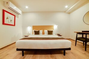 1 bedroom, desk, bed sheets