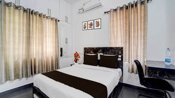 1 bedroom, desk, bed sheets