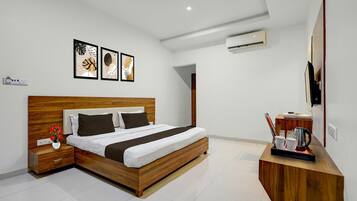 1 bedroom, desk, bed sheets