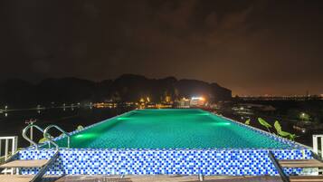 Outdoor pool, open 8:00 AM to 6:00 PM, pool loungers