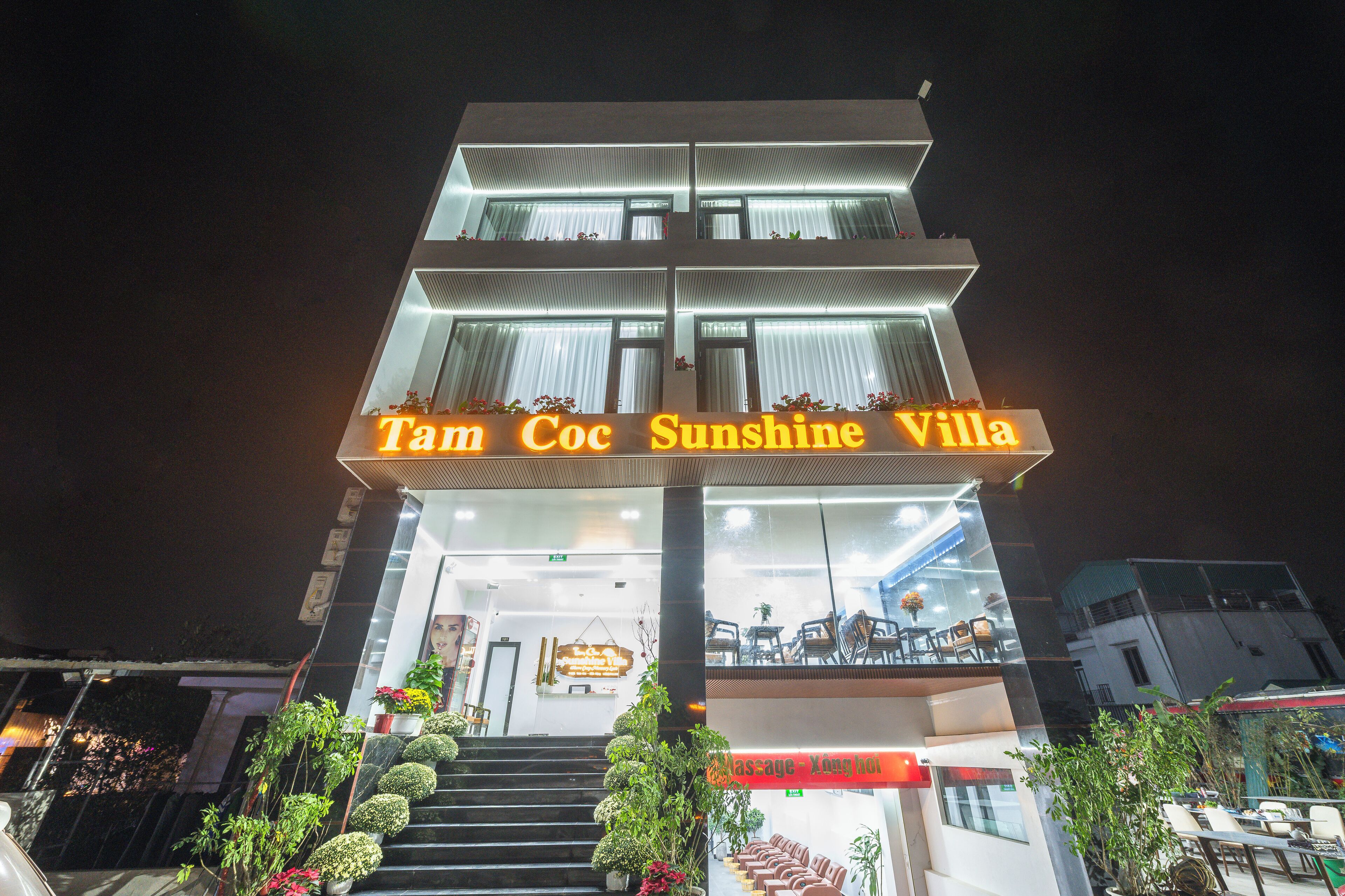 A two-story building with a sign reading "Tam Coc Sunshine Villa".