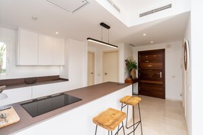 Coffee/tea maker, fridge, microwave, oven - Charming 2-Bedroom Lagoon Apartment (Casares)